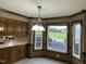 Cozy breakfast nook with wooden trim, large windows, and a view of the yard at 759 Wheeler Dr, Angier, NC 27501