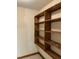 Spacious closet featuring ample shelving, ideal for organized storage and maximizing space at 759 Wheeler Dr, Angier, NC 27501