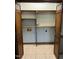 Spacious closet with bifold doors, ample shelving, and convenient outlets for versatile storage solutions at 759 Wheeler Dr, Angier, NC 27501