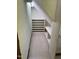 Walk in closet with white shelves and neutral carpet for optimal storage and organization at 759 Wheeler Dr, Angier, NC 27501
