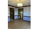 Dining room featuring wood floors, decorative trim and access to living areas at 759 Wheeler Dr, Angier, NC 27501