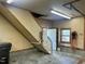 Functional garage interior featuring essential storage and utility systems, including a central vacuum at 759 Wheeler Dr, Angier, NC 27501