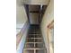 Unfinished staircase leading to an upper level, showcasing the potential for customization and renovation at 759 Wheeler Dr, Angier, NC 27501