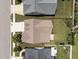 Aerial view of the home's roof and surrounding green lawn at 80 Scarlet Bell Dr, Youngsville, NC 27596