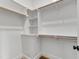 Walk-in closet with custom shelving and ample storage space at 808 Shiloh Hills Dr, Fuquay Varina, NC 27526