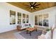 Inviting covered patio features ample seating, decorative ceiling and a view of the exterior at 808 Shiloh Hills Dr, Fuquay Varina, NC 27526