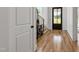 Inviting foyer features hardwood floors, staircase, and an entry door with sidelights at 808 Shiloh Hills Dr, Fuquay Varina, NC 27526