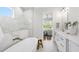 This is an alternate view of the main bathroom showing the shower, soaking tub, and a view into the main bedroom at 808 Shiloh Hills Dr, Fuquay Varina, NC 27526