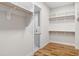 This is an alternate view of the walk-in closet, showing additional custom shelving at 808 Shiloh Hills Dr, Fuquay Varina, NC 27526