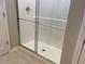 A modern shower with glass doors and a sleek, minimalist design at 85 Osgood Street, Angier, NC 27501
