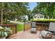 Inviting backyard deck with outdoor seating and beautiful green surroundings at 8513 Buscot Ct, Raleigh, NC 27615