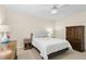 Cozy bedroom with neutral walls and light colored carpet. Complete with wardrobe and bedside tables at 8513 Buscot Ct, Raleigh, NC 27615