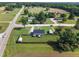 Aerial view of a home featuring fenced yard, storage shed and camper at 10 Wilders Ln, Louisburg, NC 27549