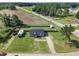 Aerial view of fenced property, with shed, RV, and ample outdoor space at 10 Wilders Ln, Louisburg, NC 27549