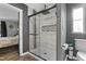 New bathroom boasts glass shower, neutral tile and convenient niche at 10 Wilders Ln, Louisburg, NC 27549