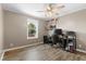Office area offering a ceiling fan and natural light at 10 Wilders Ln, Louisburg, NC 27549