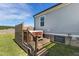 Backyard hot tub on a wood deck, creating a private and relaxing outdoor space at 10 Wilders Ln, Louisburg, NC 27549