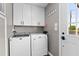 The laundry room features a new washer and dryer and extra storage space at 10 Wilders Ln, Louisburg, NC 27549