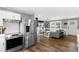 Open-concept design with a modern kitchen flowing into a comfortable living area at 10 Wilders Ln, Louisburg, NC 27549