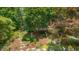 A beautiful garden is viewed from above showing flowers and rock pathways at 1007 W Markham Ave, Durham, NC 27701