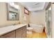 Relaxing bathroom with soaking tub, sleek vanity, and modern fixtures at 1007 W Markham Ave, Durham, NC 27701