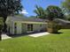 Well-maintained backyard featuring a patio and wooden pergola at 1016 Buckhorn Rd, Garner, NC 27529