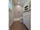 Remodeled bathroom features a stylish shower with marble tiling at 1016 Buckhorn Rd, Garner, NC 27529