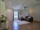 Comfortable living room featuring a cozy sectional, area rug, and large window at 1016 Buckhorn Rd, Garner, NC 27529