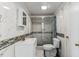 Bathroom features tiled walls, updated fixtures, glass shower, and modern toilet at 1031 Old Us 421, Lillington, NC 27546
