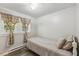 Bedroom with light gray walls, wood-look floors, and natural light at 1031 Old Us 421, Lillington, NC 27546