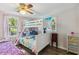 Bedroom with bunk beds, wood-look floors, and natural light at 1031 Old Us 421, Lillington, NC 27546