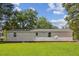 Ranch-style home with satellite dish on a grassy lot at 1031 Old Us 421, Lillington, NC 27546