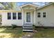 Inviting front porch with decorative plants and a charming entrance at 1031 Old Us 421, Lillington, NC 27546