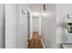 Hallway with clean white walls and wood-look floors at 1031 Old Us 421, Lillington, NC 27546