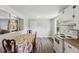 Eat-in kitchen boasts charming dining area and modern white appliances at 1031 Old Us 421, Lillington, NC 27546