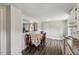 Eat-in kitchen boasts charming dining area with views to the living room and modern white appliances at 1031 Old Us 421, Lillington, NC 27546