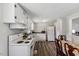 Functional kitchen featuring an oven, refrigerator, and eating area at 1031 Old Us 421, Lillington, NC 27546