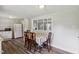 Eat-in kitchen boasts charming dining area and modern appliances at 1031 Old Us 421, Lillington, NC 27546