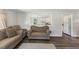 Inviting living room with hardwood floors that connects to kitchen at 1031 Old Us 421, Lillington, NC 27546