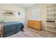 Comfortable bedroom with natural light, shelving, and ample space, a comfortable bedroom at 109 Crane Meadow Pl, Chapel Hill, NC 27514
