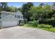 Two story home with a well manicured lawn and large driveway at 109 Crane Meadow Pl, Chapel Hill, NC 27514