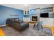 Cozy living room features a fireplace, custom built-ins, and comfortable seating at 109 Crane Meadow Pl, Chapel Hill, NC 27514
