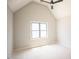 Bright bedroom featuring a ceiling fan and natural light from a large window at 1112 Delilia Ln, Wake Forest, NC 27587
