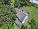 Aerial view of home showcasing roof and surrounding greenery from above at 118 N 7Th St, Smithfield, NC 27577