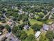 A charming home on a lush lot in a neighborhood setting from an aerial perspective at 118 N 7Th St, Smithfield, NC 27577