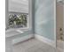 A traditional bathroom with window and bathtub and shower at 118 N 7Th St, Smithfield, NC 27577