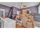 This bedroom is filled with cardboard boxes, a washer and dryer, and lots of storage at 118 N 7Th St, Smithfield, NC 27577
