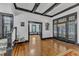 Elegant foyer featuring hardwood floors, decorative molding, and open access to other rooms at 118 N 7Th St, Smithfield, NC 27577