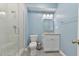 Well-lit bathroom featuring a glass shower and a modern white vanity for a clean and contemporary look at 119 Jones Creek Place Pl # 119, Chapel Hill, NC 27516