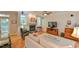 Cozy living area featuring a fireplace and access to an outdoor balcony at 119 Jones Creek Place Pl # 119, Chapel Hill, NC 27516